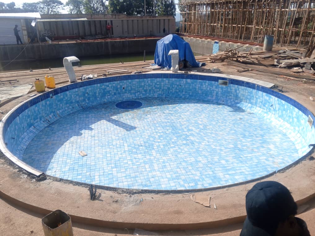 Circular Mosaic Pool Tiling